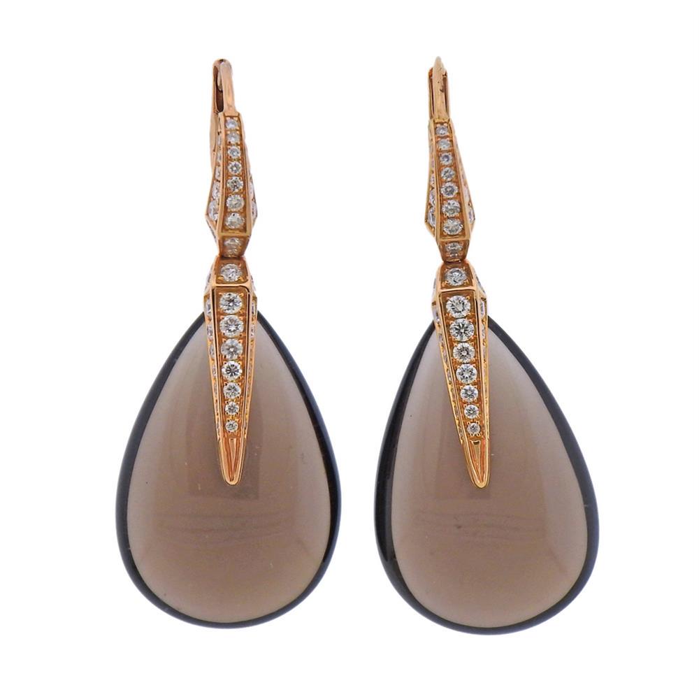 Chimento Elisir 18K Gold Diamond Smoky Quartz Teardrop: Metal Content: 18K Gold.Weight of item: 13.2 grams.Size: Earrings are 46mm x 16.5mm.Gemstone: Diamonds, Smoky Quartz Cabochon.Carat Weight: approx. 0.98ctw.Stamp: Chimento, 750.