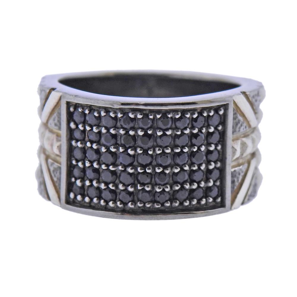 Stephen Webster Union Jack Sterling Silver Black: Metal Content: Sterling Silver.Weight of Item: 15.6 grams.Size: Ring size 10. Band is 12.5mm.Gemstone: Black Sapphires.Stamp: Stephen Webster, 925.