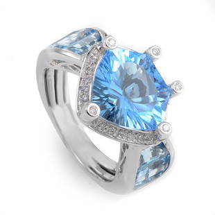 French Collection 18K White Gold Topaz and Diamond Ring: This ring from our French Collection has a beautiful blue design which sparkles with a refreshingly original beauty. The ring is made of 18K white gold and is set with 8.05ct of blue topaz. Lastly,