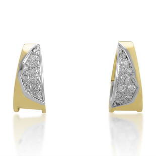 Vintage 18K Yellow White Gold Diamond Earrings: This gorgeous pair of vintage earrings are elegant and refined. The earrings are made of 18K yellow gold and are accented with diamondset white gold.