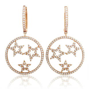 Women's 18K Rose Gold Diamond Stars Dangle Earrings: Whimsical yet elegant, these diamond earrings are perfect for a glamorous woman who knows how to have fun in the most gorgeous manner. These 18K rose gold earrings suspend stunning pave set diamonds t