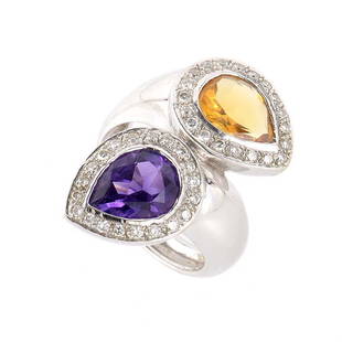 18K White Gold Amethyst Citrine Diamond Ring Size 7.25: This ring is elegant and colorful. It is made of 18K white gold and features amethyst and citrine stones accented with .40ct of diamonds.