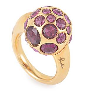 Pomellato Harem 18K Rose Gold Rhodolite Gemstone Ring: This Pomellato Harem ring is playful yet mature perfect for a sophisticated lady. It is made of 18K rose gold and features numerous rhodolite gemstones embedded into the ring.The ring is size: 6.00.