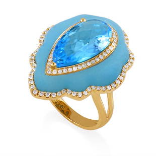 18K Yellow Gold Blue Gemstone Diamond Ring Size 6.25: Complemented in harmonious fashion by the splendid blue quartz beneath and 0.44ct of diamonds around it, the fascinating topaz stone lures you into its amazing depths, gracing this fabulous 18K