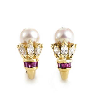 Cartier 18K Yellow Gold Diamond Pearl and Ruby Earrings: The enduring quality of this glamorous pair of earrings from Cartier is without comparison. The earrings are made of 18K yellow gold and are each set with a single white pearl. Lastly, marquisecut