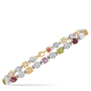 18K YG & WG .50ct Diamond and Gemstones Bracelet: The dynamic splendor of this estate jewelry cannot be denied. This dainty and feminine twotoned bracelet features 6.00 carats of different semiprecious stones set on fourprong 18K yellow gold setting