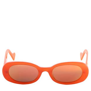 Gucci Orange and Gold Oval Sunglasses GG0517S 004: These Gucci sunglasses were made in Italy and boast an oval shape. The trendy sunglasses have gold lenses and an orange frame, which is accentuated by goldtoned interlocking GG details featured on