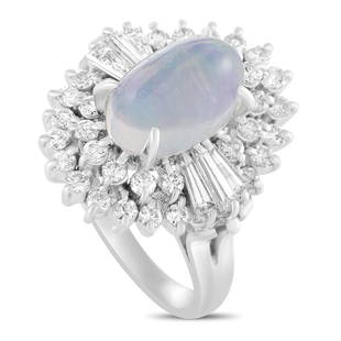 Platinum Diamond and Opal Oval Ring Size 6.5: Add a compelling touch of luxe glisten to your ensembles with this ravishing platinum ring that boasts an exceptionally classy design and incredibly lustrous gemstone dcor. The ring is set with an