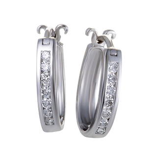 14K WG .25 Ct VS1 G Color Diamond Oval Hoop Earrings: These incredible 14K white gold earrings are a combination of beauty and allure. The stunning earrings are covered in beautiful 0.25ct diamonds that add glam and splendor to the exquisite piece.