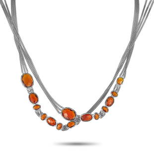 Gucci Raindrop Silver & Synthetic Orange Stone Necklace: The Gucci Raindrop necklace is crafted from silver and embellished with synthetic orange stones. The necklace weighs 30 grams and measures 38 in length. This jewelry piece is offered in brand new