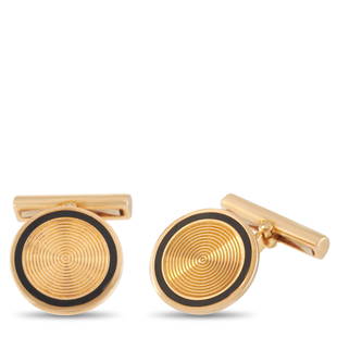 Van Cleef & Arpels 18K YG Enameled Men's Cufflinks: The Van Cleef Arpels 18K Yellow Gold Enameled Men's Cufflinks features a round polished 18K yellow gold front face with spiral engraving. The textured finish complements the attractive black enamel