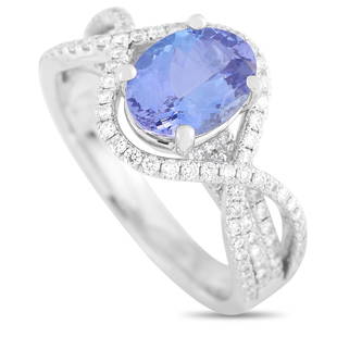 18K WG 2.10 ct Tanzanite & 0.75 ct Diamond Ring - 6.5: This stunning Ring is made with 18K white gold and set with 0.75 carats of diamonds throughout the band and surrounding a gorgeous 2.10 carat tanzanite. The ring has a band thickness of 3 mm, a top