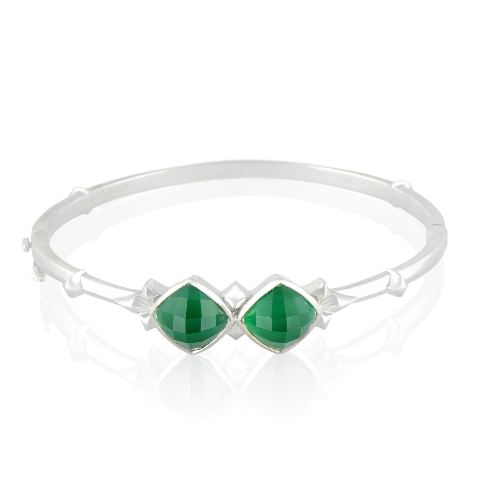 Stephen Webster Silver Chrysoprase Bracelet: Blending spotless brightness with attractive color, this stunning bangle from Stephen Webster boasts the quintessential Superstud design, made of white rhodiumplated silver and set with appealing synt