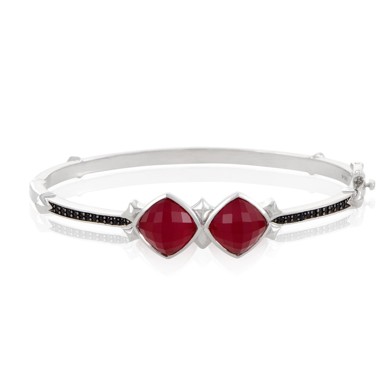 Stephen Webster Superstud Silver Quartz Bracelet: The tasteful blend of compelling gems includes fabulous synthesized coral stones, splendid quartz and stunning black sapphires amounting to 0.23ct in this fantastic bangle from Stephen Webster's Super