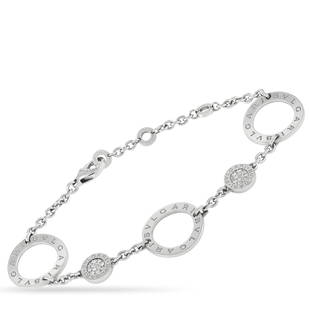 Bvlgari 18K White Gold Diamond Circle Chain Bracelet: This beautiful chain bracelet is a versatile accessory that can elevate any outfit. The Bvlgari 18K White Gold Diamond Circle Chain Bracelet features alternating openwork rings and flat circular