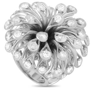 Dior Feu D'Artifice 18K WG 6.50 ct Diamond Ring - 6.0: The Dior Feu D'Artifice cocktail ring is made of 18K white gold and embellished with diamonds that amount to 6.50 carats and are E color, VVS clarity. The ring weighs 58 grams and boasts band