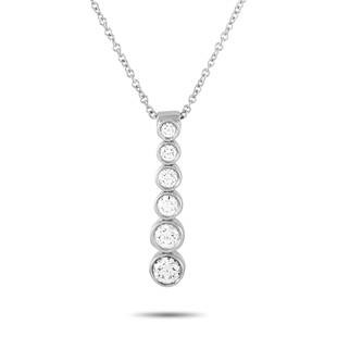 Tiffany & Co. Platinum 0.45 ct Diamond Necklace: The Tiffany & Co. Jazz necklace is made of platinum and weighs 4.6 grams. It is presented with a 15 chain and boasts a pendant that measures 0.88 in length and 0.19 in width. The necklace is