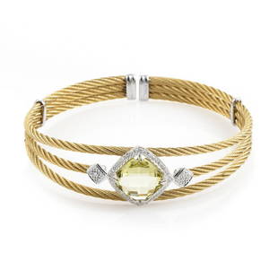 Charriol Celtic Steel Diamond Cable Bracelet: From Charriol's Celtic Classique Collection, this yellow PVD coated stainless steel Celtic Cable Bracelet boasts a diamond shaped lemon citrine stone surrounded by .09ct white diamonds in an 18K