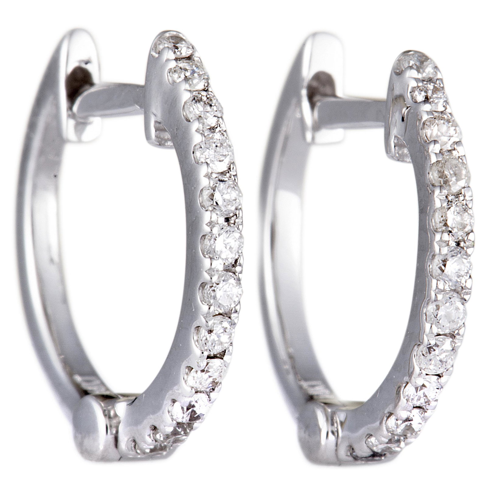 14K WG .16 Diamond Hoop Earrings: Impressively crafted from 14K white gold, these enchanting earrings are neatly decorated with 0.16ct of spectacularly processed diamond stones.