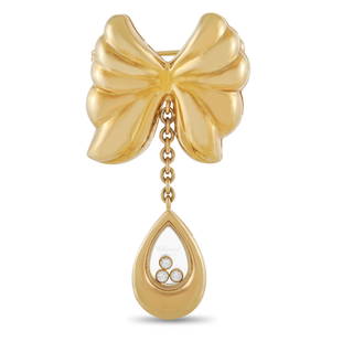 Chopard Happy Diamond 18K YG Brooch: This Vintage Chopard Happy Diamond Brooch is a luxury piece with a certain sense of whimsy. The perfect addition to any jacket lapel, hat, or collar, it features a stunning 18K Yellow Gold bow.