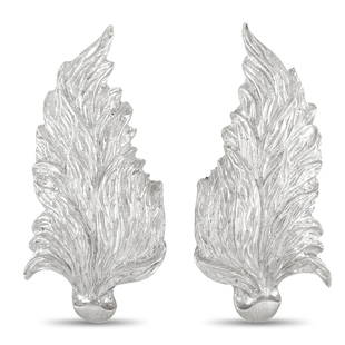 Buccellati 18K White Gold Leaf ClipOn Earrings: From the masters of texture, these Buccellati 18K White Gold Leaf Clip Earrings will give your jewelry collection a luxurious upgrade. These earrings designed with intricate engraving and attractive