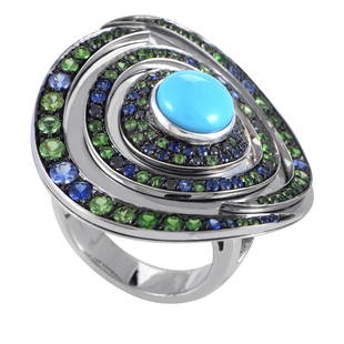 Boucheron 18K WG Blue Green Gemstone Ring Size 6.75: Designed in a spiraling and wonderfully crooked manner with a splendid turquoise stone set amidst a majestic arrangement of marvelous tsavorites and nifty sapphires, this astonishing 18K white gold