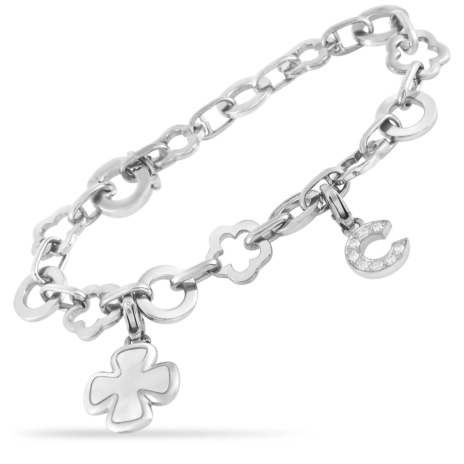 Chanel 18K WG Diamond Floral Link Charm Bracelet: The Chanel 18K White Gold Diamond Floral Link Charm Bracelet is both dainty and bold. it is designed with alternating openwork floral and round disc links forming a 7.5inch long bracelet. Two dangling