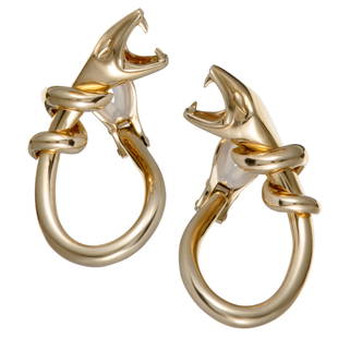 Boucheron 18K Yellow Gold Snake ClipOn Earrings: These extraordinary earrings compel with their intriguing design and incredibly fashionable appeal. The pair is designed by Boucheron and made of 18K yellow gold.