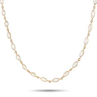 18K Yellow Gold 10.88 ct Diamond Necklace: This necklace is a simple, luxury piece that will shimmer and shine every time it catches the light. Accented by a series of marquise diamonds totaling 10.88 carats, it measures 27 long and features