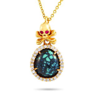 King Baby 18K YG Diamond, Ruby Turquoise Necklace: This King Baby necklace is crafted from 18K yellow gold and boasts an 18 chain onto which a 1.25 by 0.55 pendant is attached. The pendant is set with diamonds, rubies, and a turquoise. The necklace we