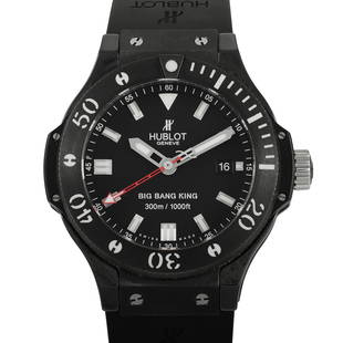 Hublot Big Bang King Black Magic Chrono Watch: This Big Bang King 'Black Magic' automatic wristwatch from Hublot features a 45mm case in ceramic with brushed and polished finishes. It comes with a black ceramic bezel with ridged edges and