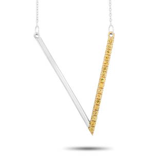 14K White Gold 0.29 ct Yellow Sapphire V Pendant Necklace: This unique 14K White Gold 0.29 ct Yellow Sapphire V Pendant Necklace is a subtle statement piece that includes a delicate 14K White Gold chain that is 17 inches in length and features a lobster