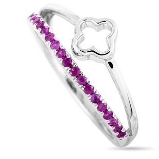 14K White Gold and Ruby Ring Size 7.25: This ring is crafted from 14K white gold and set with rubies that amount to 0.25 carats. The ring weighs 2.7 g, boasting band thickness of 2 mm and top height of 5 mm, while top dimensions measure 9