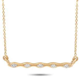 14K Yellow Gold 0.06 ct Diamond Necklace: Theres something enchanting about this sleek, sophisticated necklace. Crafted from 14K Yellow Gold, the simple pendant measures 0.85 long, 0.07 wide, and is adorned with glittering diamonds totaling 0