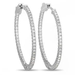 14K White Gold 0.92 ct Diamond Inside Out Hoop Earrings: These elegant hoop earrings are equal parts stylish and sophisticated. A sleek 14K White Gold setting provides the perfect backdrop for a series of diamonds, which together total 0.92 carats.