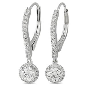 Messika 18K White Gold 0.84 ct Diamond Drop Earrings: These stunning Messika earrings are sure to wow. The earrings are made with 18K White Gold and are set with a single row of roundcut diamonds over the face of each hoop. Hanging from each hoop is a be