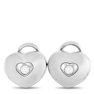 Chopard Happy Diamonds 18K White Gold 0.20 ct Diamond ClipOn Earrings: These Chopard Happy Diamonds are sweet, simple, and sophisticated. Each one features a circular setting crafted from 18K White Gold that measures 0.5 long by 0.6 wide. A transparent heart at the