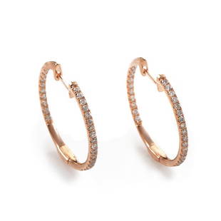 14K Rose Gold .51 Carat VS1 G Color Diamond Hoop Huggies Earrings: This harmoniously designed pair of hoop earrings is made of lovely warmtoned 14K rose gold and set with 0.51ct of sparkly diamonds.