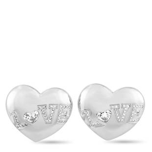 Chopard 18K White Gold Diamond Heart Earrings: These Chopard earrings are crafted from 18K white gold and set with a total of 1.44 carats of diamonds that feature FG color and IFVVS clarity the two heartshape stones total 1.03 carats and the