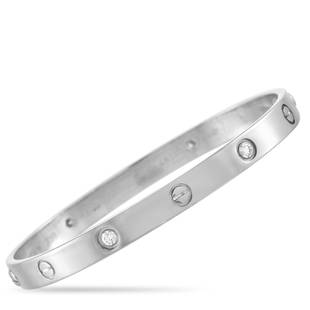 Cartier LOVE 18K White Gold 4 Diamond Bracelet Size 19 Size 19: It doesnt get any more iconic than this 7.5 bangle bracelet from the Cartier Love collection. Adorned with 4 diamonds and the brands signature screw accents, this size 19 bracelet is ideal for