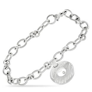 Chopard Happy Diamonds 18K White Gold 0.03 ct Diamond Bracelet: This breathtaking bracelet from the Chopard Happy Diamonds collection will elevate any luxury jewelry collection. Crafted from 18K White Gold, this piece measures 7.5 long and features secure lobster