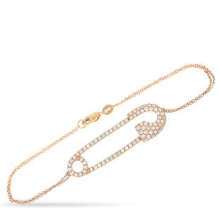 18K Rose Gold 1.00 ct Diamond Safety Pin Bracelet: Add a unique sense of charm to your jewelry collection with this elegant bracelet. Crafted from 18K Rose Gold, this luxury piece measures 7.5 long. A bold safety pin accent at the center which