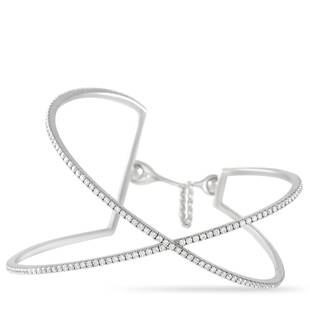 Messika 18K White Gold 1.54 ct Pave Diamond Crossover Bangle Bracelet: This beautiful Messika 18K White Gold Skinny 1.54 ct Pave Diamond Wide Crossover Bangle Bracelet adds the perfect touch of sparkle. The bracelet is made with a thin band of sleek 18K white gold,