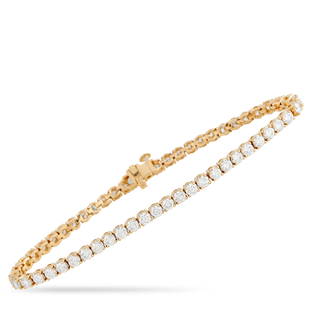 14K Yellow Gold 6.63 ct Diamond Tennis Bracelet: Elevate your jewelry collection with this luxurious tennis bracelet. Covered in diamonds with a total weight of 6.63 carats, this piece is made from 14K Yellow Gold and measures 7.25 long. This