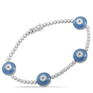 18K White Gold 1.20 ct Diamond Evil Eye Bracelet: This luxury bracelet is a bold piece with a commanding presence. Diamonds totaling 1.20 carats sparkle and shine from their place within this bracelets 18K white gold setting. But its the bold blue