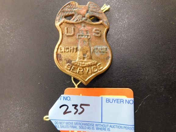 brass lighthouse service badge (1 of 1)