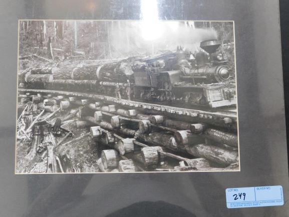 locomotive photograph: Black and white locomotive photograph hauling a load of logs Darius Kinsey Seattle