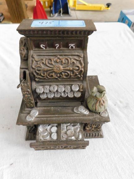 cast iron cash register statue (1 of 2)
