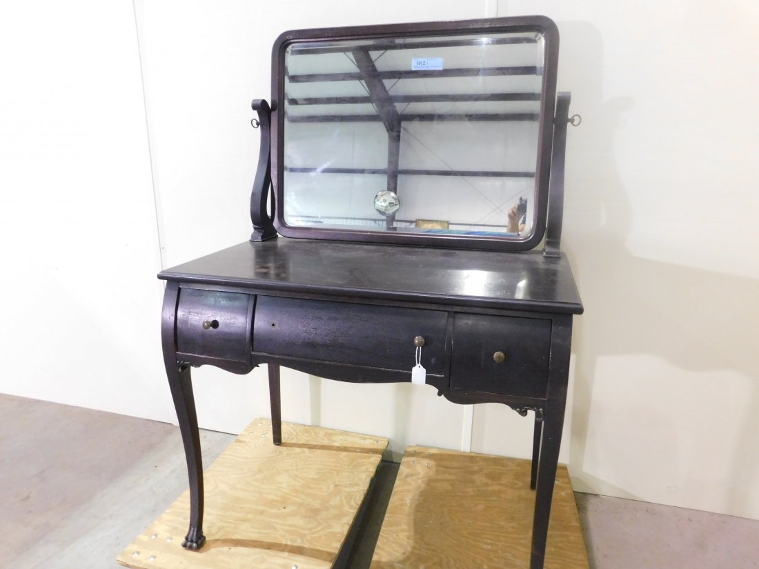 Vanity with Beveled Edge Mirror: Mahogany (?) vanity with beveled edge mirror, 3 drawers, missing one small knob. Approximately 37 1/2 inches wide, 54 1/2 inches tall, 22 inches deep. Overall fair condition, some scratches and light 