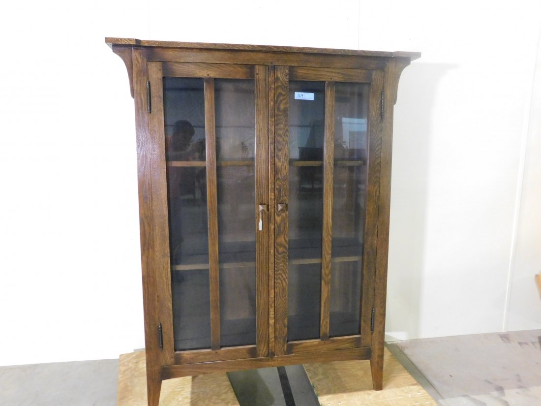 mission oak china/book case: beautiful mission oak china cabinet/ book case two doors two shelves approx. 51 1/2" wide 67"tall 19" deep in excellent condition see pictures